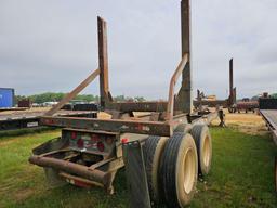 1128 - 1991 MACK LOG TRAILER