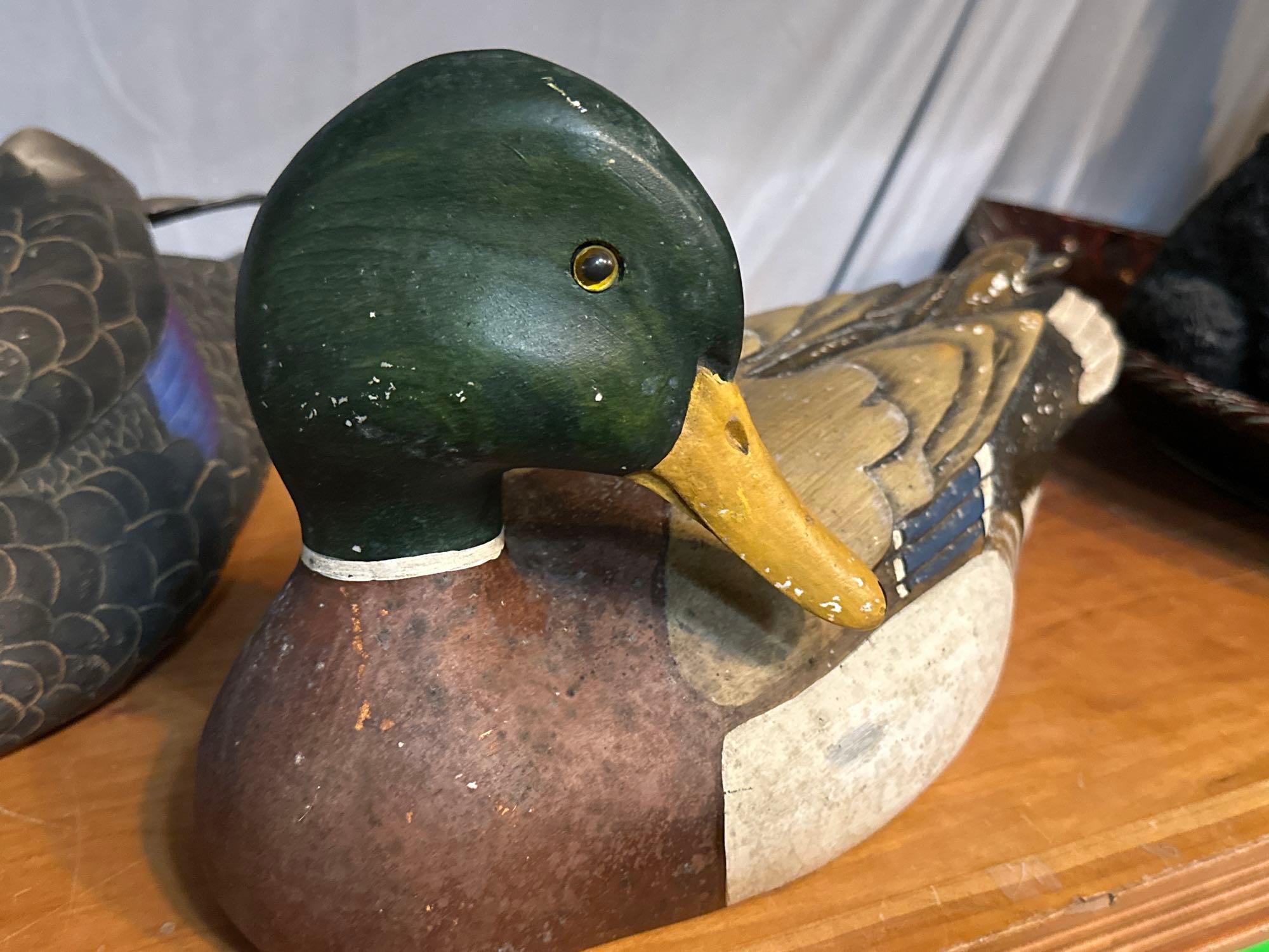 2 Carved Ducks from Ducks Unlimited - one is signed by Tom Taber
