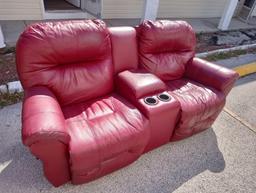 DEEP RED DUAL ROCKER RECLINER WITH CENTER CONSOLE STORAGE AND CUP HOLDERS