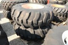 TWO TITAN 16.9-24 TIRES & RIMS WITH 8 BOLT CENTERS