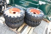 FOUR BOBCAT 29X10.50-15NHS TIRES WITH 6 BOLT RIMS (UNUSED)