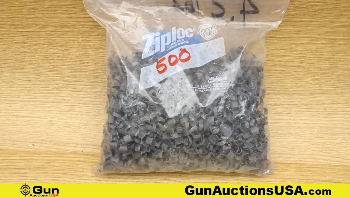 5.6x45, .50 caliber Links. Approx. 290- 5.6x45 Links, and Approx. 322 -.50 caliber links. . (70464)