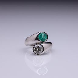 18k White Gold Moissanite & Emerald Crossover Ring by Carlo Rici