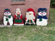 Christmas decor, tears snowman, and Santa Claus and his wife elves and fire Place decor