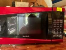 Red and black microwave works good and shed