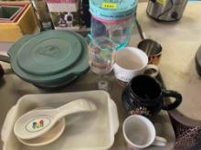 glass dishes, cast iron muffin pan, coffee cups