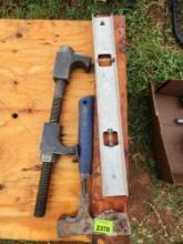 level, coil spring compressor and roofing hatchet