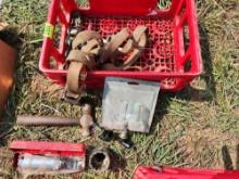 plastic crate with hammer, lightbulbs, ratchet strap, sockets, impact driver