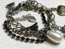 ?Paris at Night? Gold and Silver tone Charm Bracelet