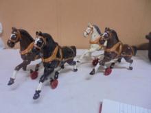 2 Sets of Cast Iron Running Rolling Horses