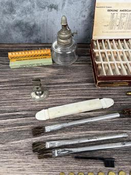 Collection Of Antique Watch Parts And Tools