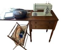 Kenmore Sewing Machine + assorted sewing supplies