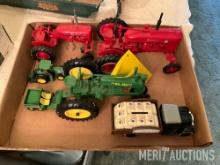 (2) Farmall toy tractors, JD toy tractor, Pioneer truck