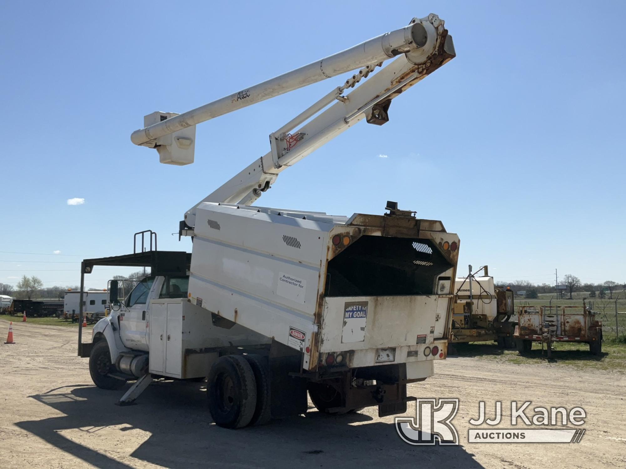 (Charlotte, MI) Altec LR756, Over-Center Bucket Truck mounted behind cab on 2012 Ford F750 Chipper D