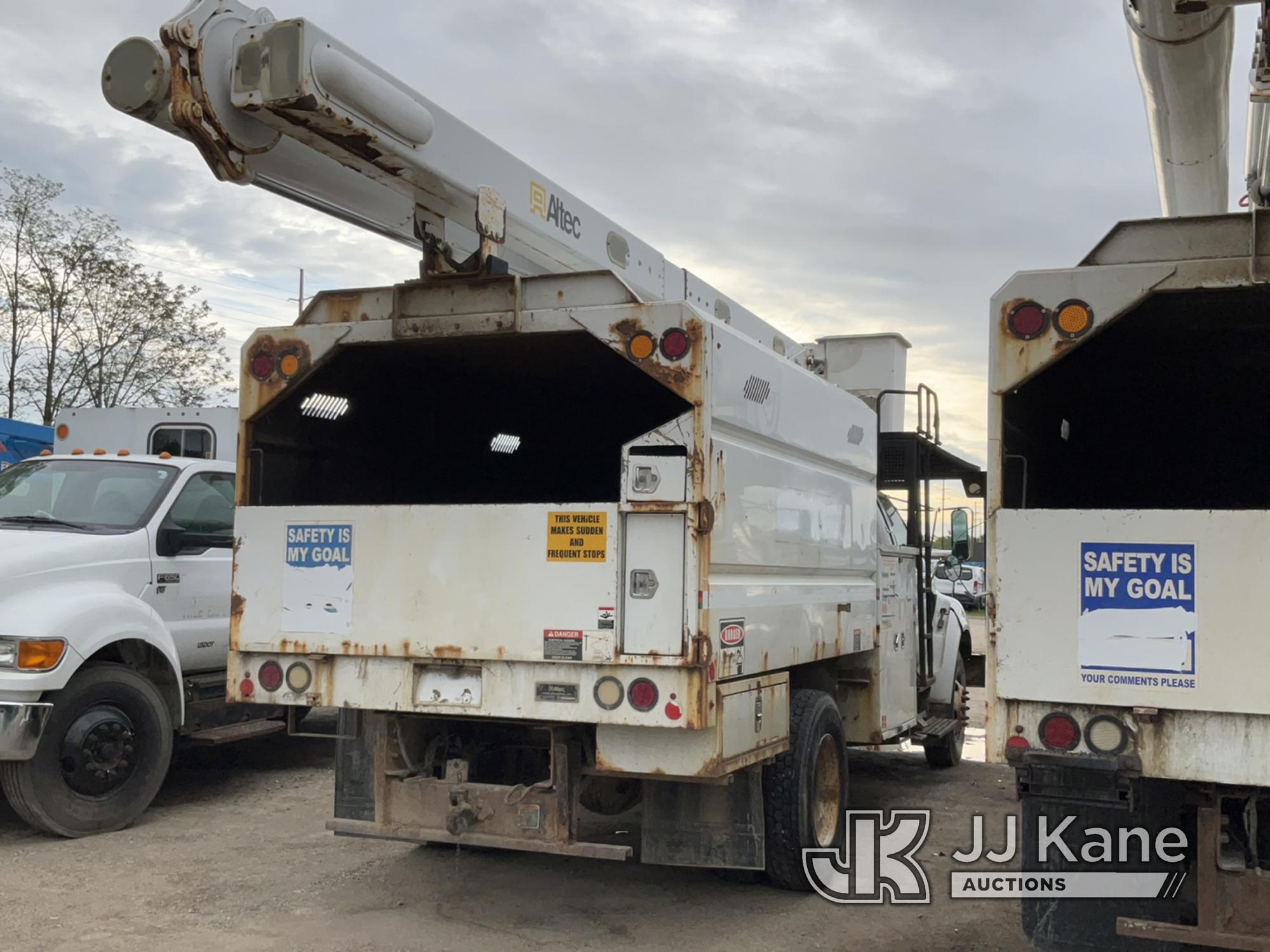 (Charlotte, MI) Altec LRV55, Over-Center Bucket Truck mounted behind cab on 2010 Ford F750 Chipper D