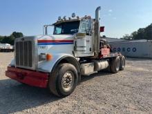 2012 Peterbilt 367 w/ dual winches, showing 54,221 miles 4,417 hrs/ runs