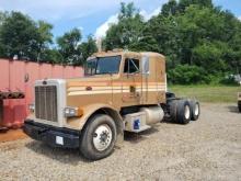 1998 Peterbilt 379 showing 313,120 mi, 8,201 hrs / runs