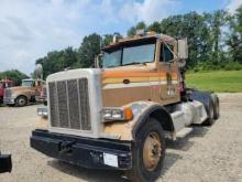 2001 Peterbilt 379 w/ winch showing 226,127 mi, 6,710 hrs / runs