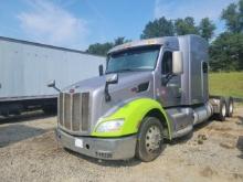 2015 Peterbilt w/ sleeper showing 767,633 mi, 20,694 hrs/ runs,