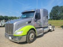 2015 Peterbilt showing 379,556 mi, 18,909 hrs/ runs