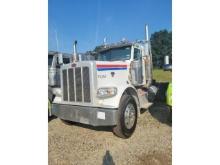 2013 Peterbilt 388 showing 23,658 mi, 2,614 hrs/ runs