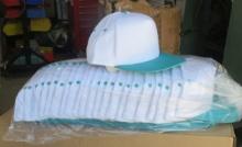 unprinted Baseball snap-back hats (one size fits all…white and teal)