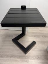 Side Table Powder Coated  Aluminum and Finished in Black To Be Picked Up in Boca Showroom