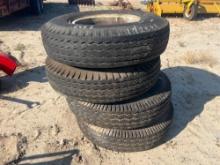 (4) 10.00 - 20 TIRES W/ DAYTON RIMS