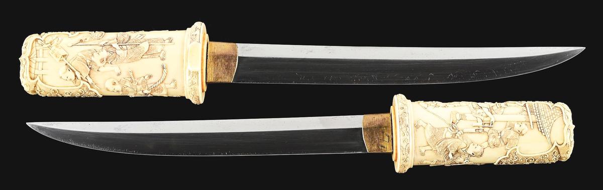 AN UNUSUALLY GOOD QUALITY IVORY MOUNTED TANTO.