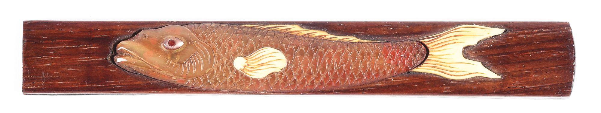 UNUSUAL WOOD HANDLED KOZUKA DEPICTING A FISH WITH MOTHER OF PEARL AND IVORY ACCENTS.