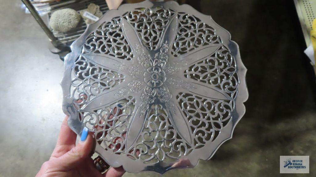 Raymond Silverplate trivet and other trivets