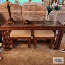 Decorative sofa table with two rolling stools. Matches lots 144 and 181.