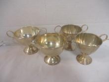 Two Weighted Sterling Creamer and Sugar Bowl Sets