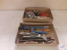 Wire Strippers, assorted insulated wire terminals, measuring tape, wrench, and assortment of