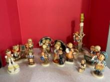 12 Hummel figurines and a Hummel lamp