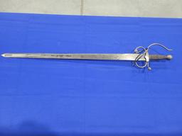 Replica Saber Replica saber, does have etching up and down blade, ornate hand shield, measures 39"