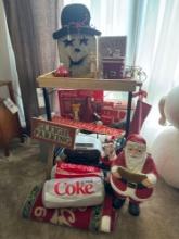 three tier cart with Coca-Cola and Santa decor and collectibles