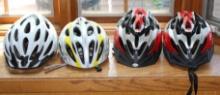 Four Bike Helmets by Schwinn, Giro, and Airius