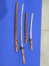 Replica Samurai Swords Set of matching replica Samurai swords, some corrasion on blades, no markings