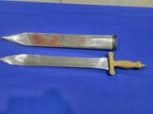 Small Heavy Sword w/ Metal Cover Small heavy metal sword, brass appear handle, is marked India, come